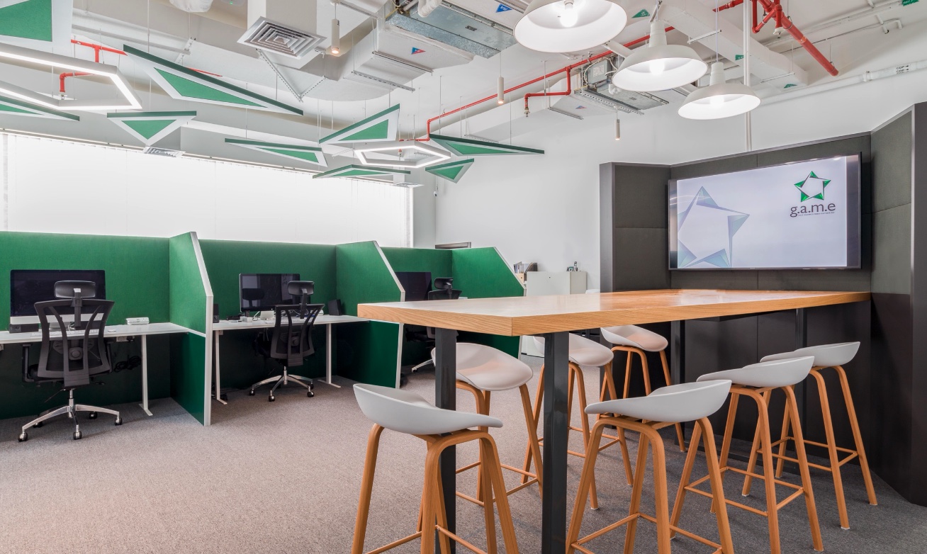 GAME's Jebel Ali Waterfront facility: edit bays and meeting table
