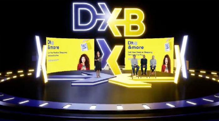 A neon virtual stage with a panel and a host
